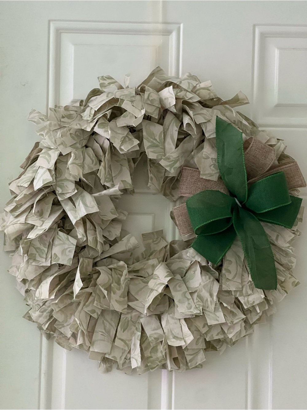 Neutral Cream Fabric Wreath with Green Bow Accent